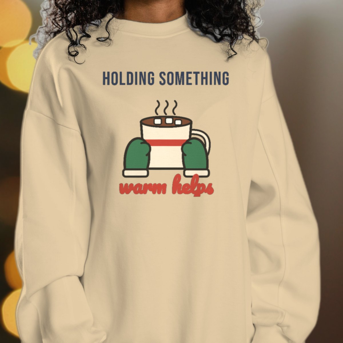 Holding Something Warm Helps Sweatshirt in sand
