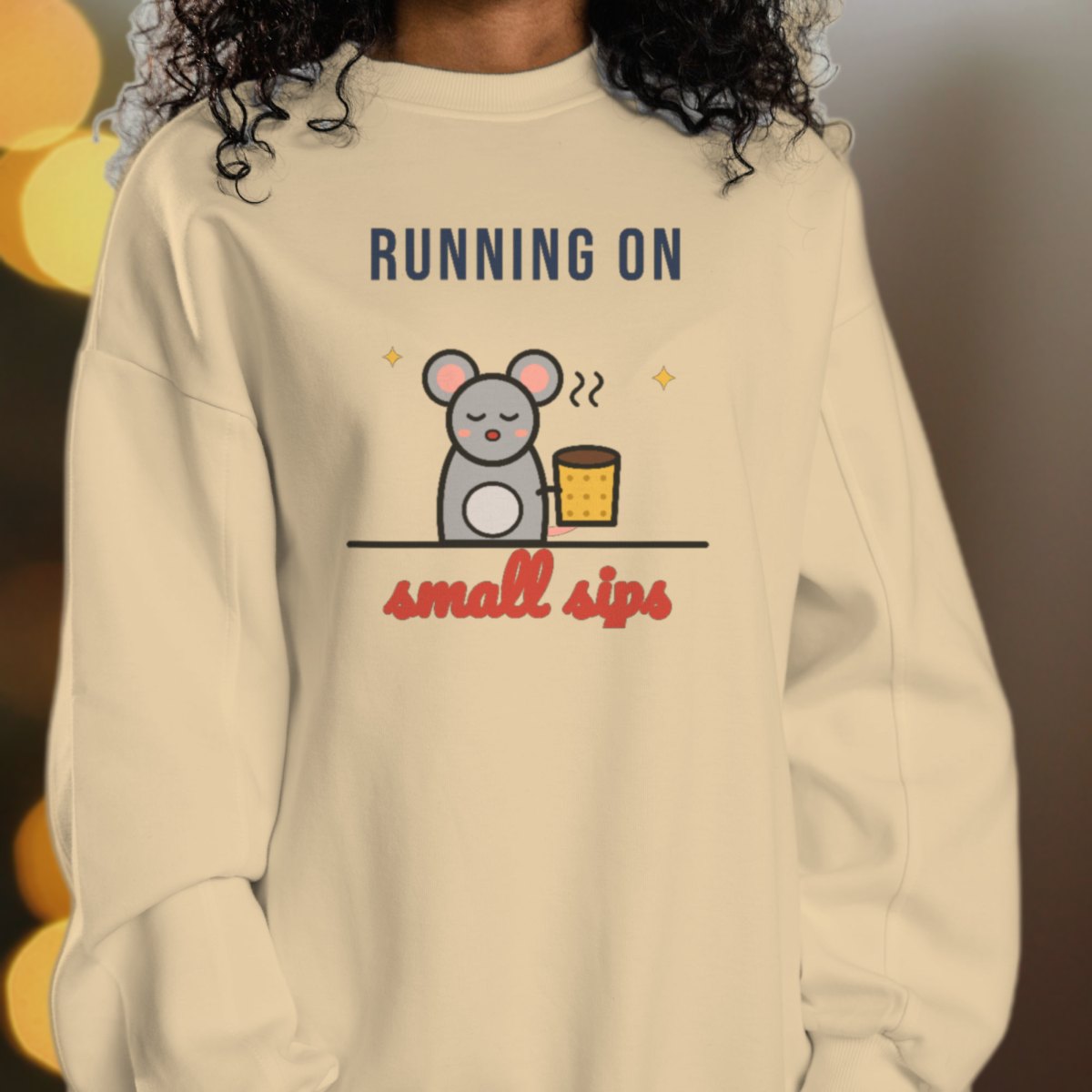 Running on Small Sips Sweatshirt in sand