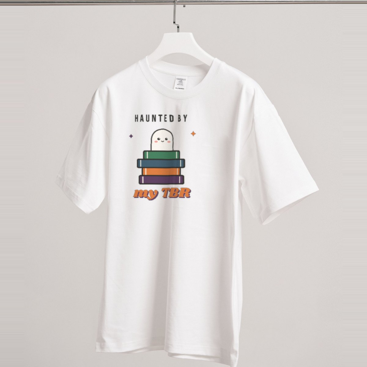 Haunted by My TBR Tee in white